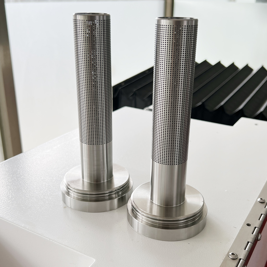 Precision CNC-machined round holes on stainless steel filtration cores