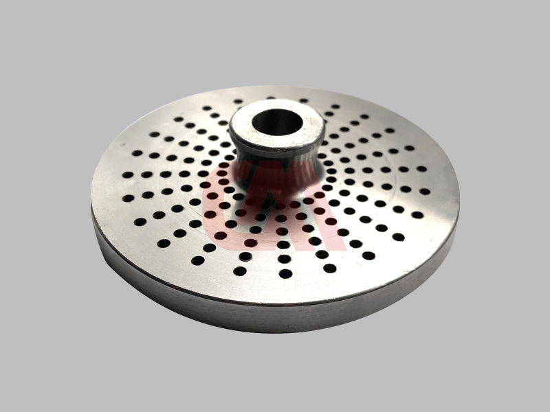 Forming Precision Extruded Holes in Stainless Steel Discs with CNC Technology